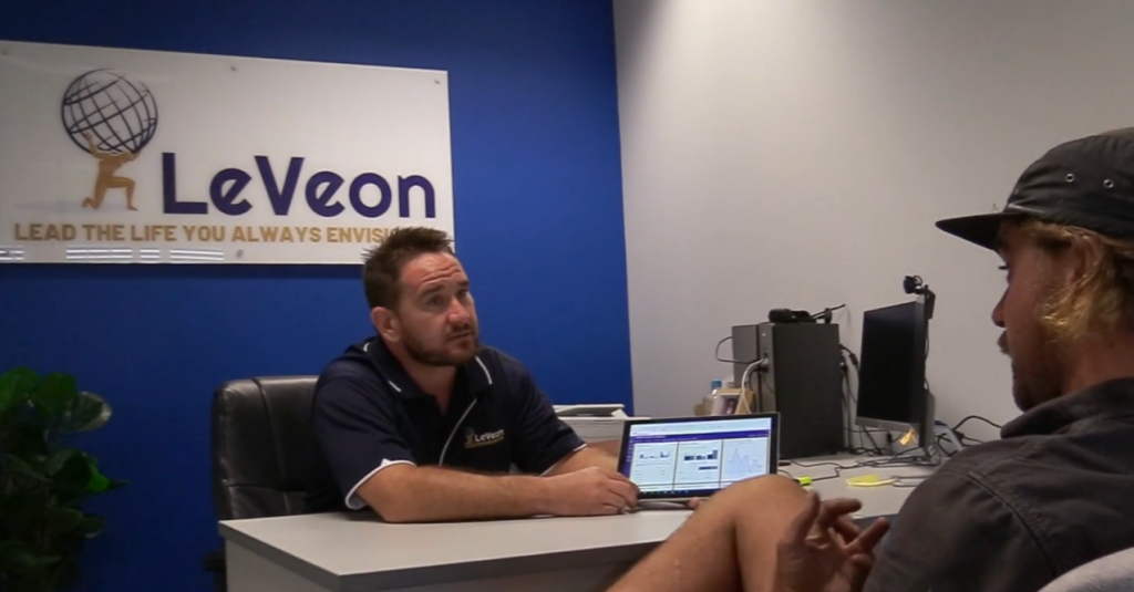 Cash flow management for trades business owner reviewing financial reports and project margins